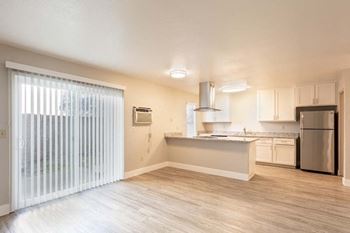 Wood floors in kitchen with stainless steel appliances